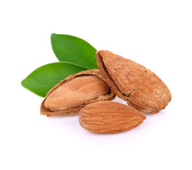 Almond with leaves isolated on white