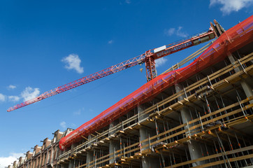 Fototapeta premium Construction crane and the building