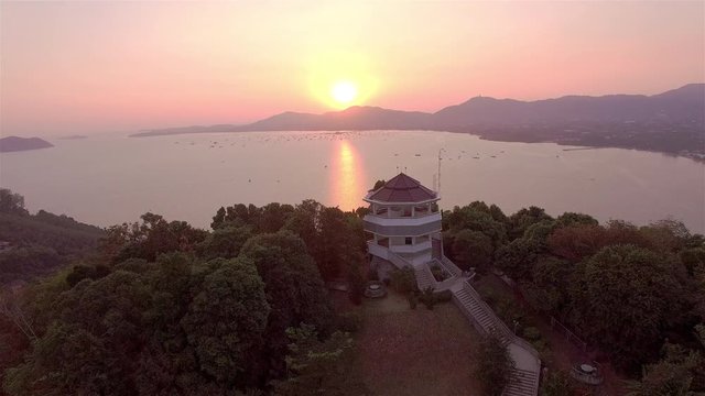 aerial photography on khao khad view point Phuket
sunset at Khao Khad view point the sun going down to the roof view point building Khao Khad view point can  see around Phuket island 360 degree