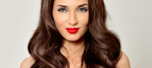 Beauty Woman with  Long Brown Hair.Gorgeous Hair. Red lipstick.