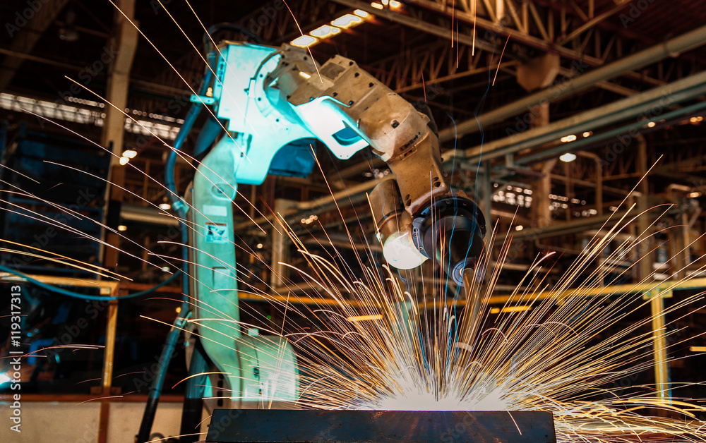 Wall mural Robot welding in factory