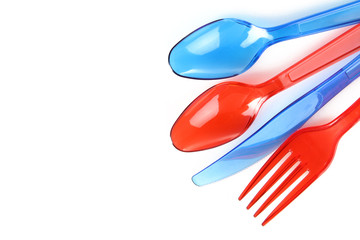 Plastic cutlery on a white isolated background
