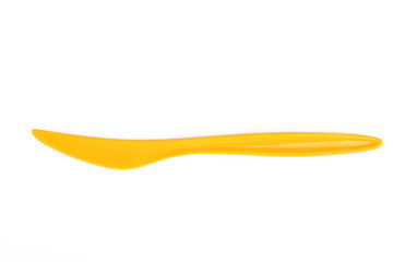 Plastic knifes on a white isolated background