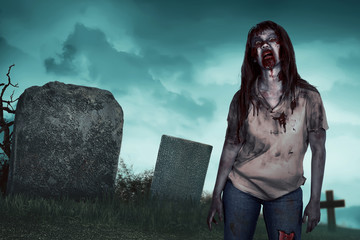 Asian zombie woman on the cemetery