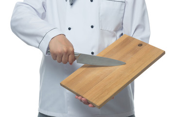 Cook shows the board and a knife in the hands of