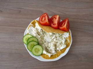 pancake with ricotta and oregano with vegetables