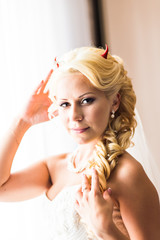 Bride with horns of the devil for Halloween