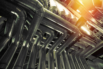 different size and shaped pipes and valves at a power plant