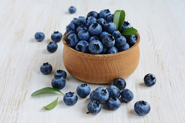 Blueberries in the wooden bowl