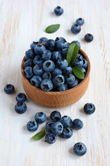 Blueberries in the wooden bowl