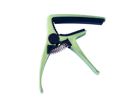 Guitar green capo on white background , close up