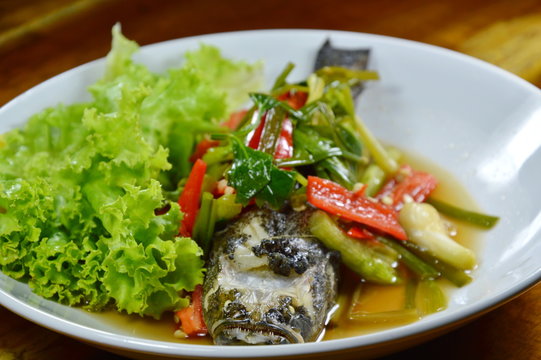 steamed sand goby fish with soy sauce on plate