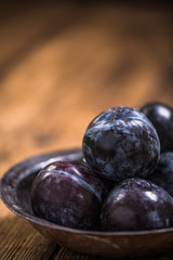 dark blue ripe plums