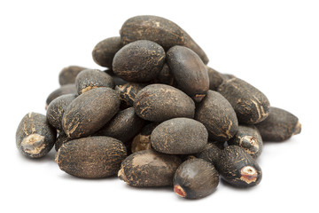 Fototapeta na wymiar Organic Barbados nut (Jatropha curcas) seeds. Isolated on white background. Front view.