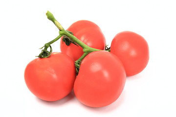 Group of small red tomatoes