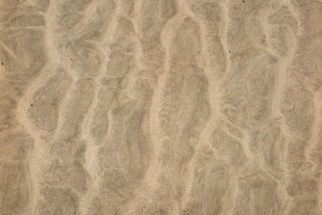 Fototapeta na wymiar Sand Texture. Brown sand. Background from fine sand.