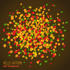 Hello Autumn. Copy space with falling leaves. Round area made of autumn leaves. Warm fall colors. Dark background. Text frame. Colorful foliage postcard in warm colors. Can be used as poster or flyer.