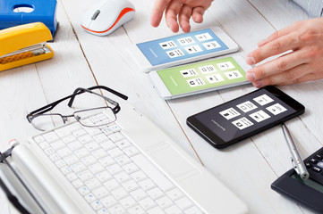 Businessman wonders which smartphone will be better for him