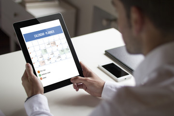 businessman calendar with tablet pc