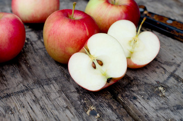 ripe apples on a wooden table