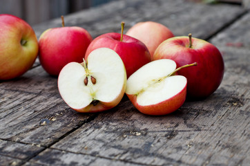 ripe apples on a wooden table