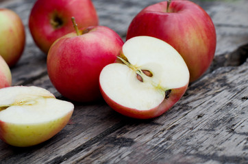 ripe apples on a wooden table