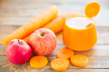 Carrot juice in glass on  table