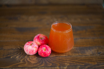 Carrot juice in glass on  table