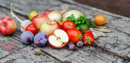 vegetables and herbs on wooden background