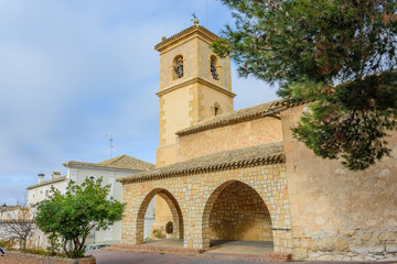 Fototapeta na wymiar Stone church with the porticoed entrance