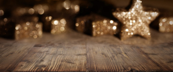 Wooden table with christmas background