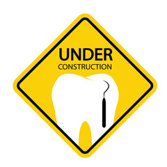 Under construction tooth sign.