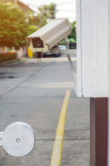 Closeup CCTV security camera at the entrance of the village.