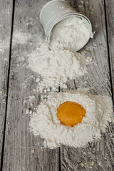 cooking spaghetti on a wooden background milk eggs
