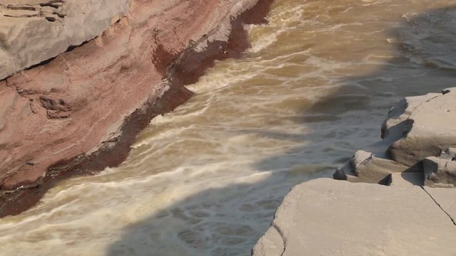 View to the Yellow river (Huang He) next to the Hukou waterfall in Yichuan, China. Hukou is the largest waterfall at Yellow river and the second largest in China.
