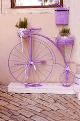  Purple bicycle - Rustic, vintage bicycle outdoors on street