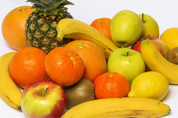 Assortment of fresh fruits isolated on white background