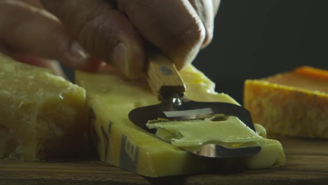 Slow motion slicing cheese