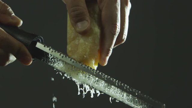 Shaving a block of cheese