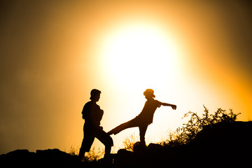 Silhouette taekwondo man at morning.