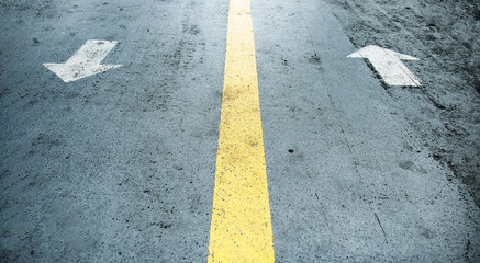 Fototapeta premium White arrow on the road