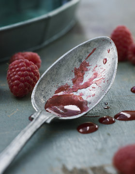 Close-up of spoon with raspberry juice, Sweden
