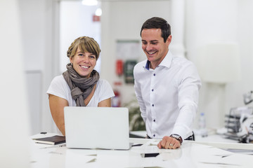 Business people using laptop, Stockholm, Sweden