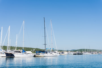 mast against a blue sky, ship mast, marina in European city, the