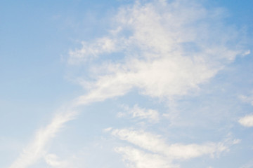 feather clouds on a blue sky