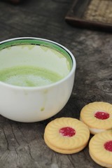 Strawberry biscuits with green tea is delicious.