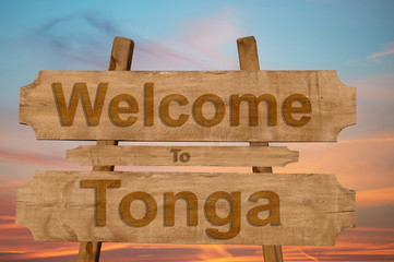 Welcome to Tonga sing on wood background