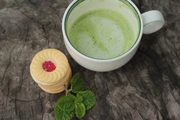 Strawberry biscuits with green tea is delicious.