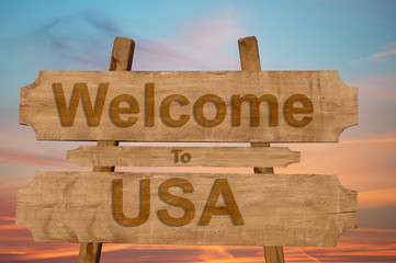 Welcome to USA sing on wood background