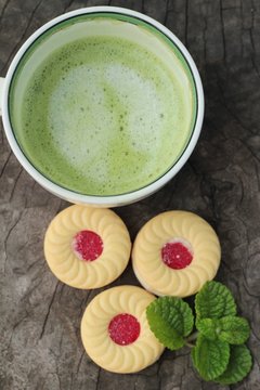 Strawberry biscuits with green tea is delicious.